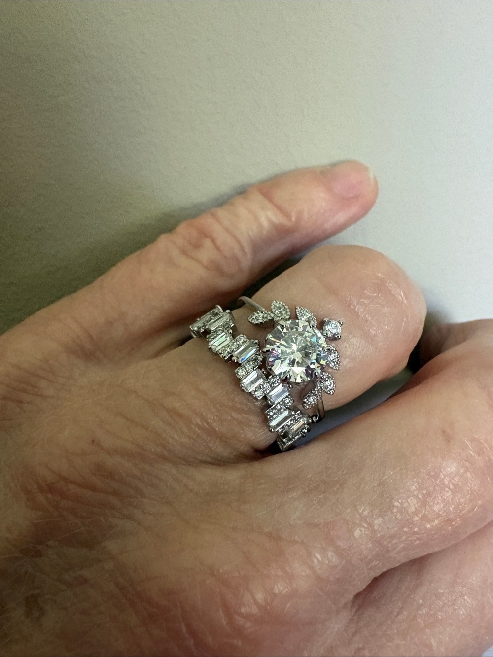 Silver Rings with white Cubic Zirconia stones. Both fit well together
So Pretty! - Picture 2 of 12